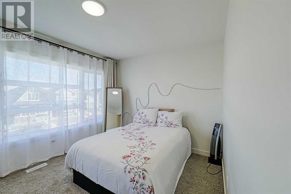 Single Family House for Sale in  Belmont Green SW Belmont Calgary 