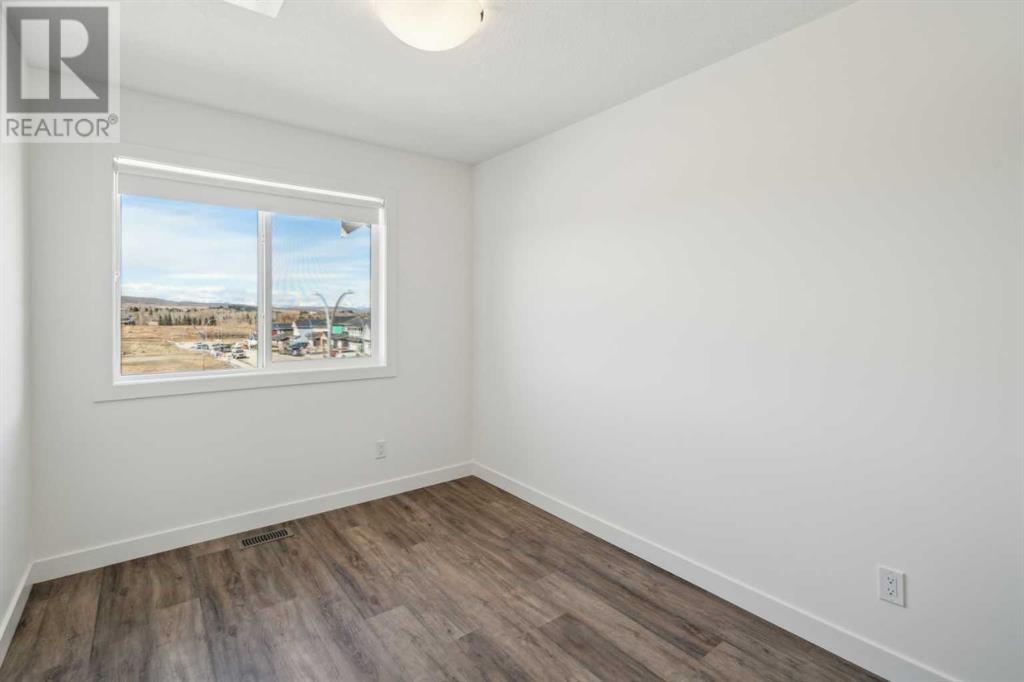 204, 24 Rivercrest Drive, Cochrane, Alberta