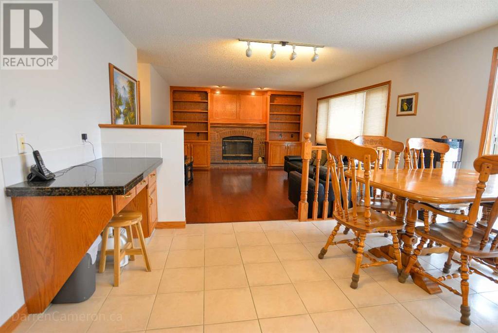 Single Family House for Sale in  Hawktree Circle NW Hawkwood Calgary 