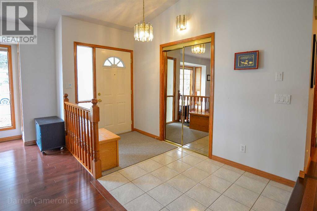 Single Family House for Sale in  Hawktree Circle NW Hawkwood Calgary 