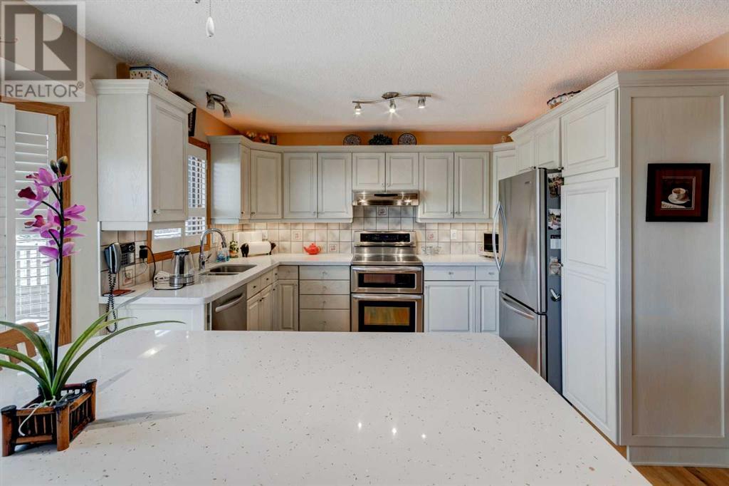 Single Family House 4 Level for Sale in  Sanderling Rise NW Sandstone Valley Calgary 