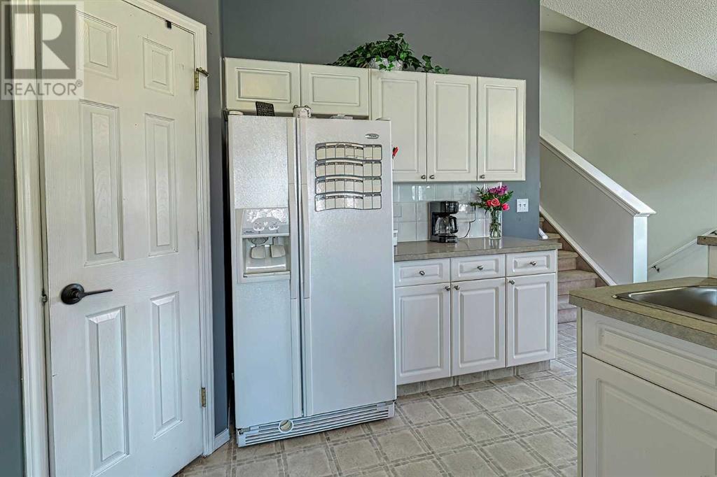 Single Family House 4 Level for Sale in  Arbour Meadows Close NW Arbour Lake Calgary 