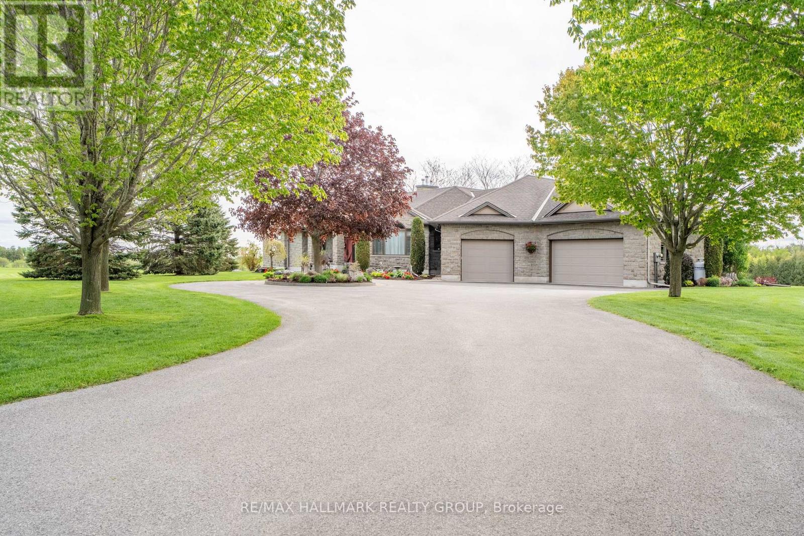 Wide Driveway with3 Car Garage