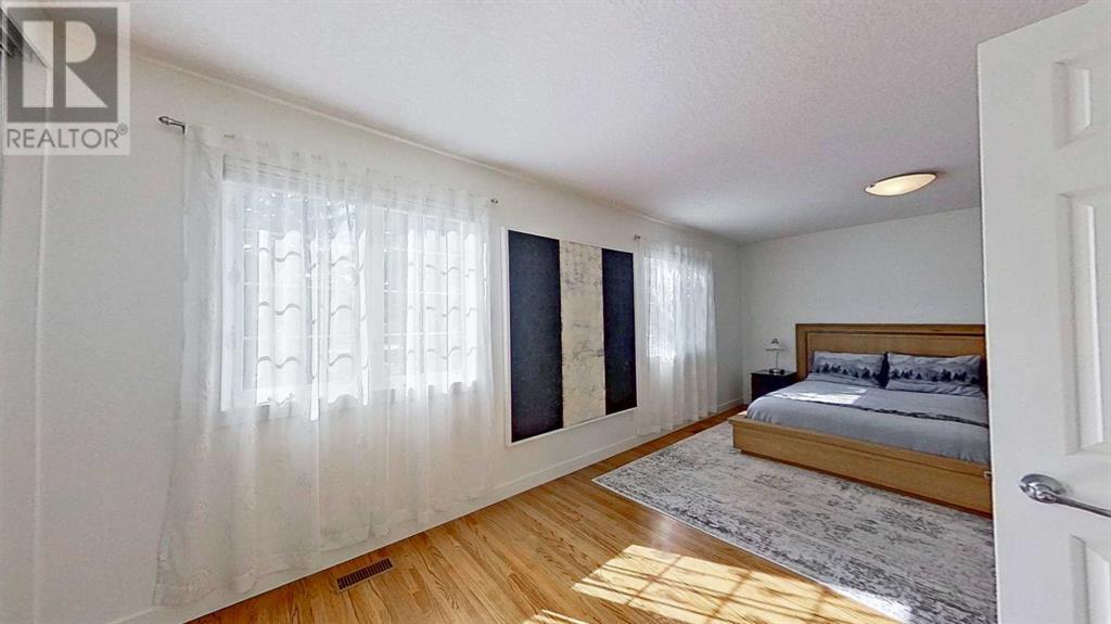 Single Family House 3 Level for Sale in  Lathom Crescent SW Lakeview Calgary 