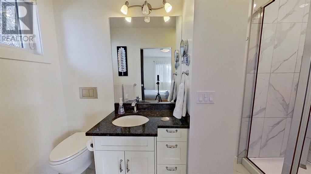 Single Family House 3 Level for Sale in  Lathom Crescent SW Lakeview Calgary 