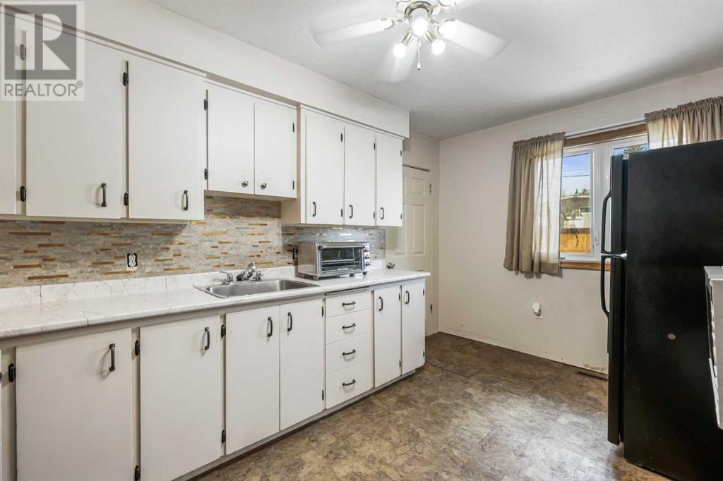Single Family House Bungalow for Sale in   Street SW Glenbrook Calgary 