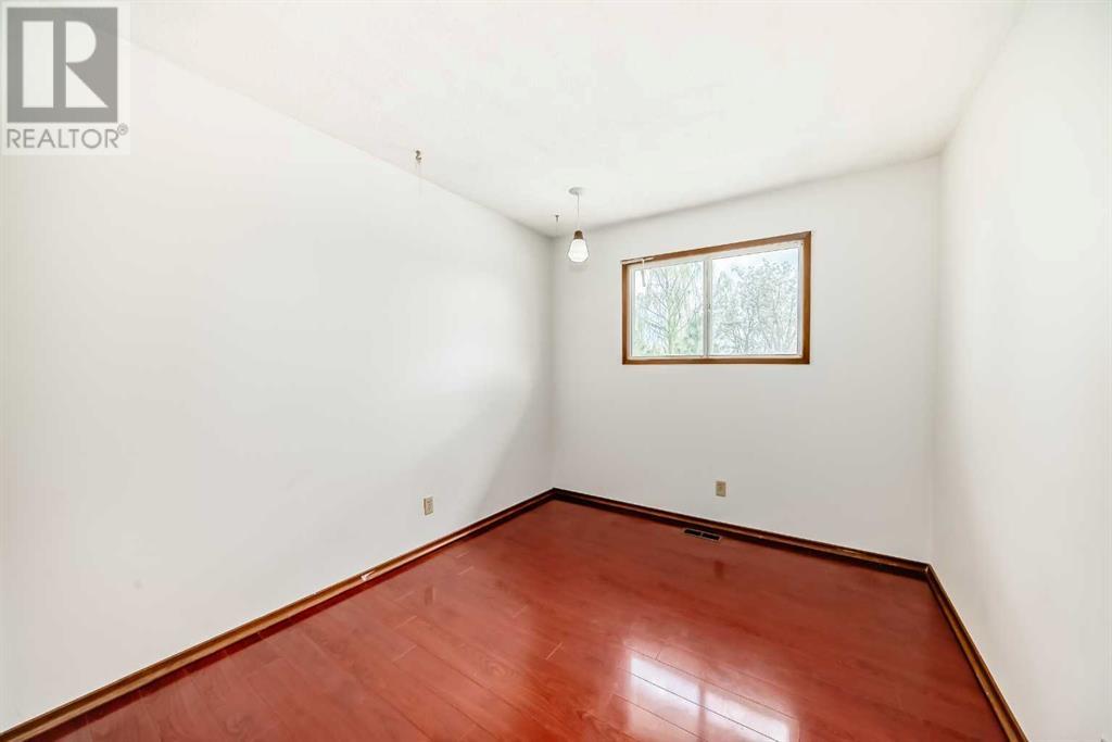 Single Family House Bi-level for Sale in  Barron Drive NW Brentwood Calgary 