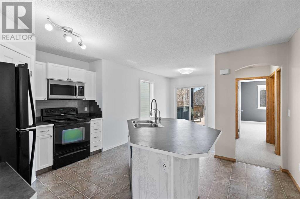 Single Family House 4 Level for Sale in  Covebrook Close NE Coventry Hills Calgary 