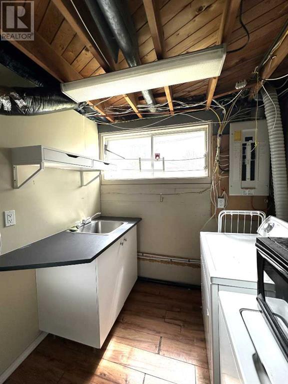 Single Family House 3 Level for Sale in  Kingsland Place SW Kingsland Calgary 