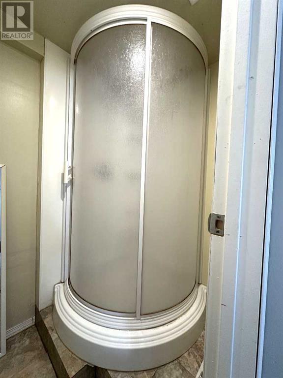 Single Family House 3 Level for Sale in  Kingsland Place SW Kingsland Calgary 