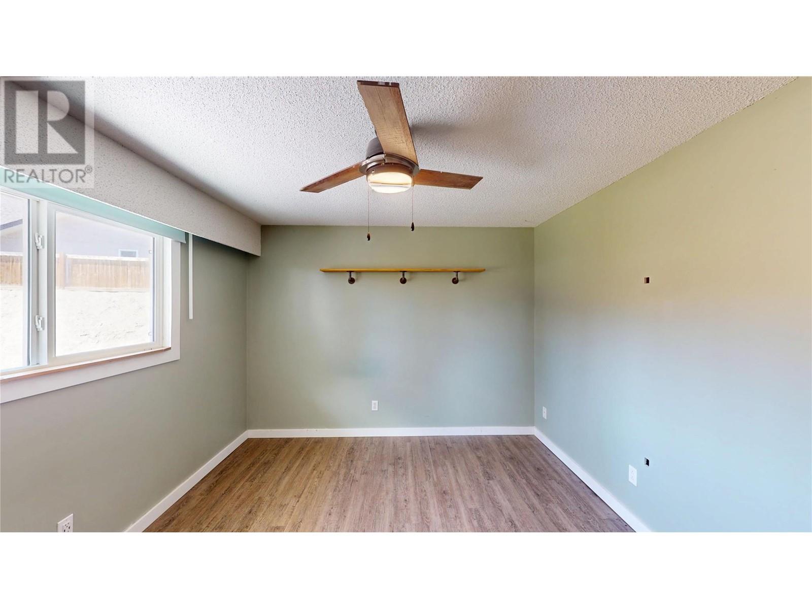 533 WOODLAND Drive NW, Cranbrook
