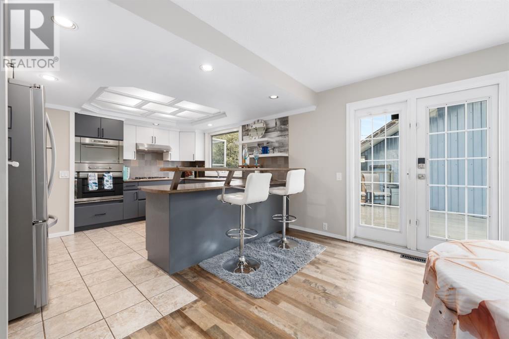Single Family House 4 Level for Sale in  Penswood Place SE Penbrooke Meadows Calgary 