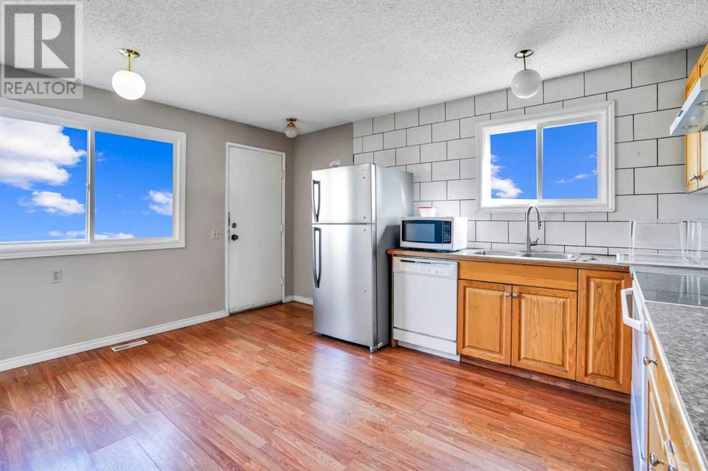Single Family House Bi-level for Sale in  Faldale Close NE Falconridge Calgary 