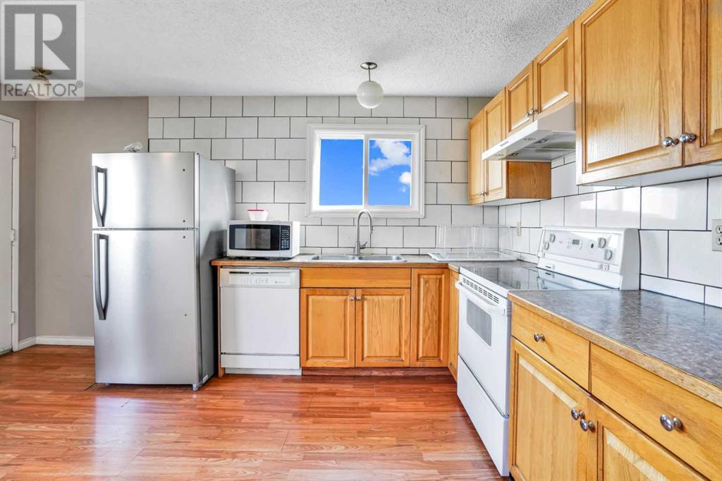 Single Family House Bi-level for Sale in  Faldale Close NE Falconridge Calgary 