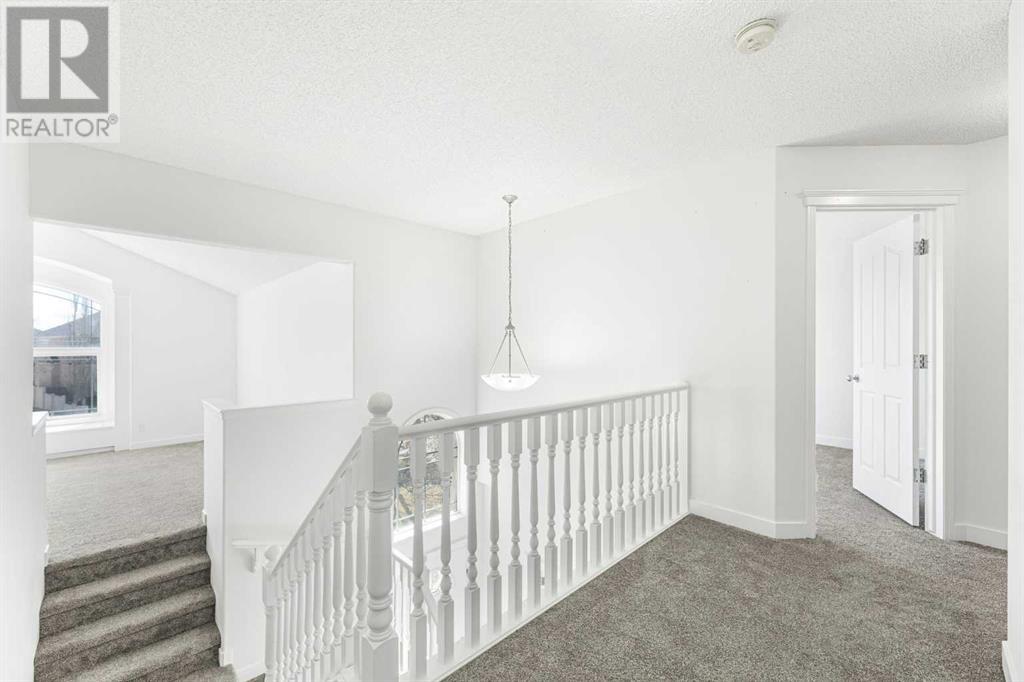 Single Family House for Sale in  Strathlea Grove SW Strathcona Park Calgary 