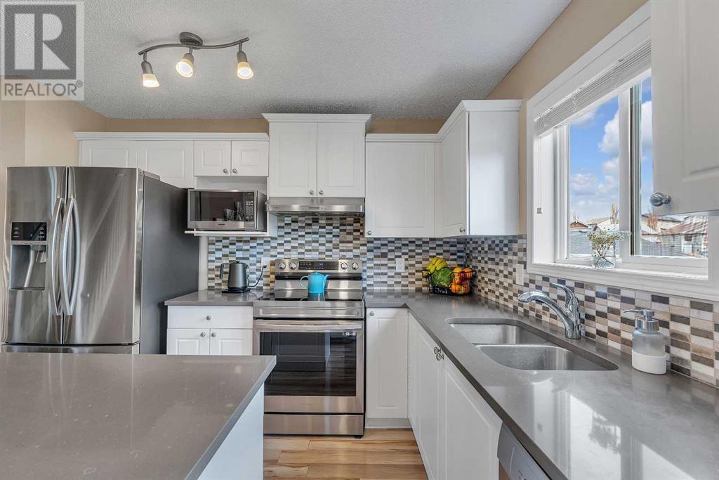 Single Family House for Sale in  Covepark Close NE Coventry Hills Calgary 