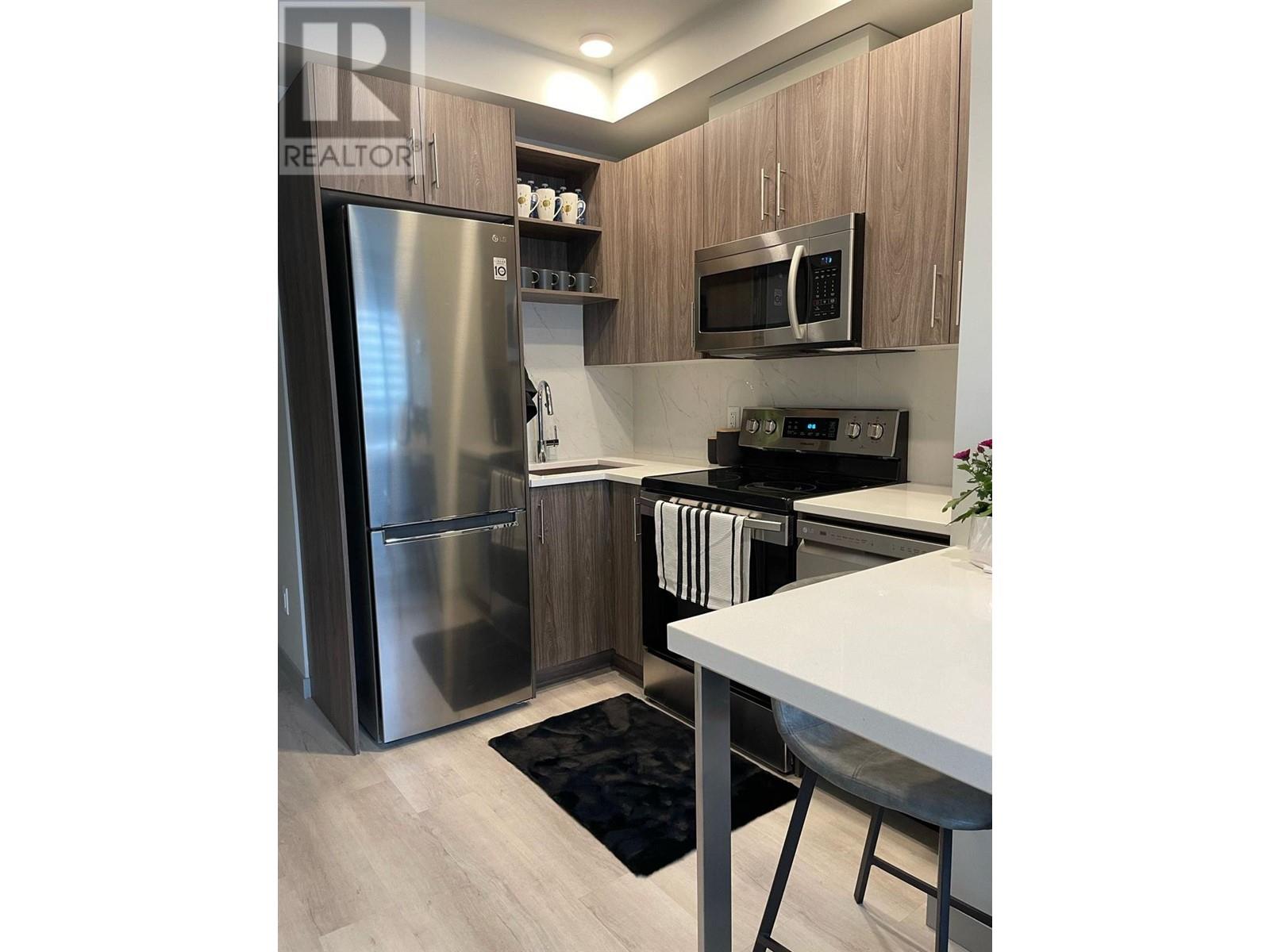 #215 345 DOUGALL ROAD N - Image 5