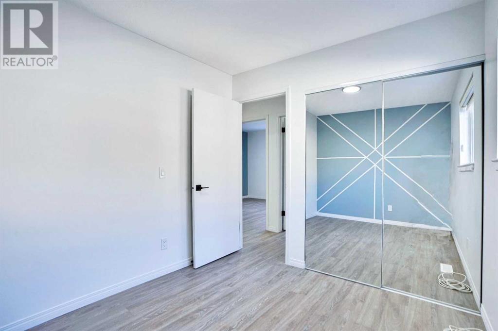Single Family House 3 Level for Sale in  Laguna Way NE Monterey Park Calgary 