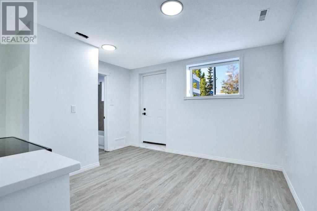 Single Family House 3 Level for Sale in  Laguna Way NE Monterey Park Calgary 