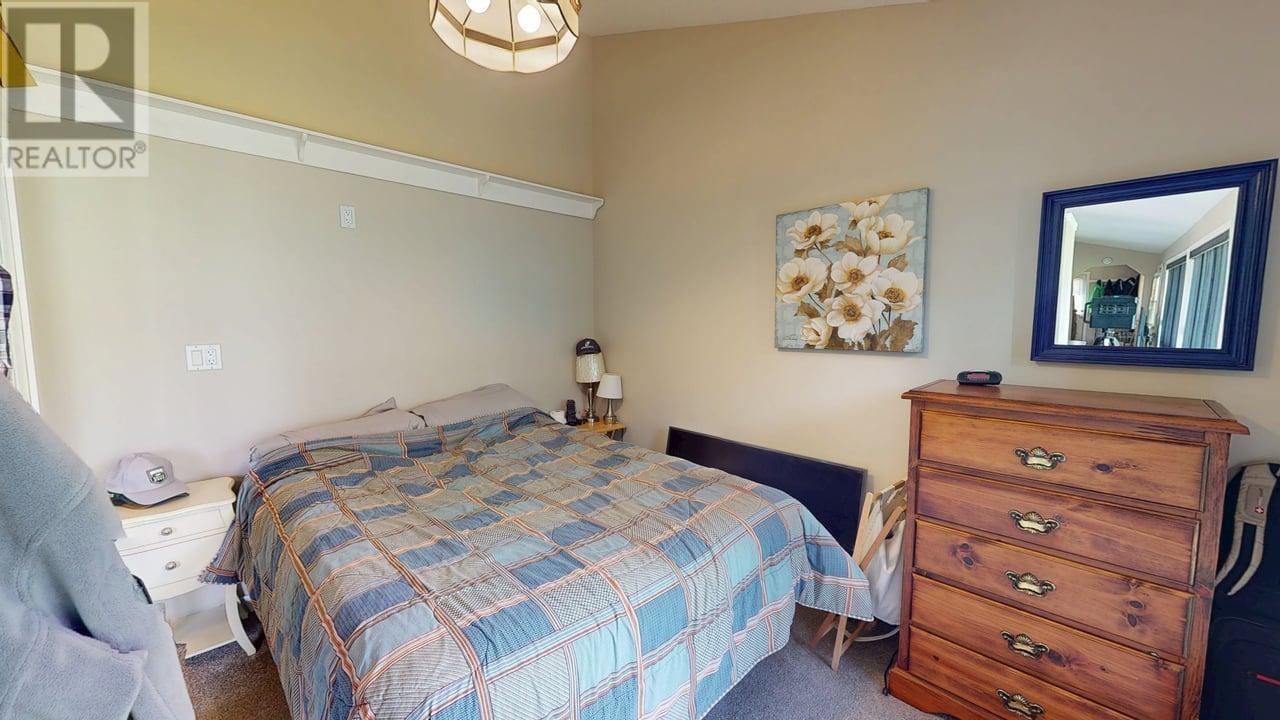 Photo 11 of 13744 Golf Course Road, Charlie Lake BC
