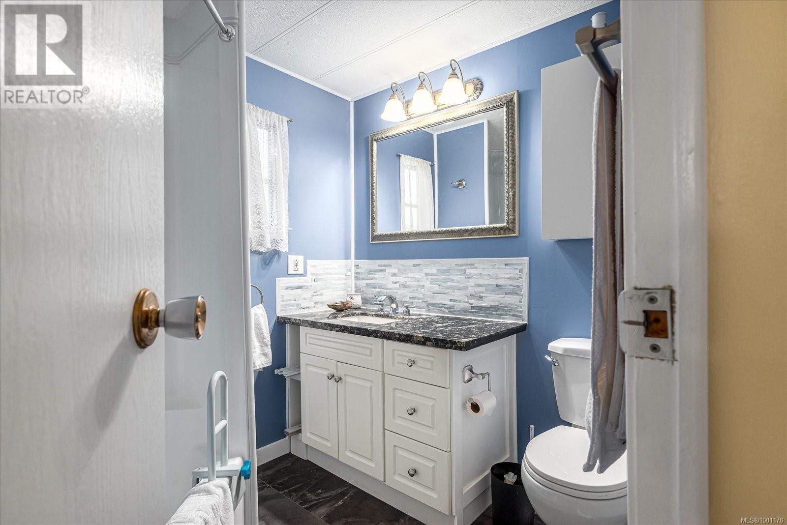 Photo 16 of 7 1247 Arbutus Rd, Parksville BC