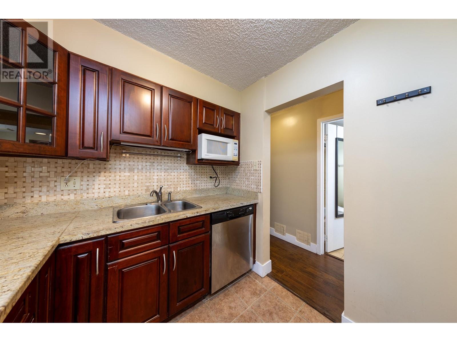 Photo 10 of 204 9521 Cardston Court, Burnaby BC