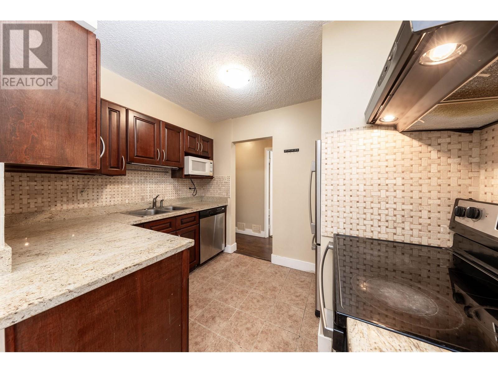 Photo 12 of 204 9521 Cardston Court, Burnaby BC