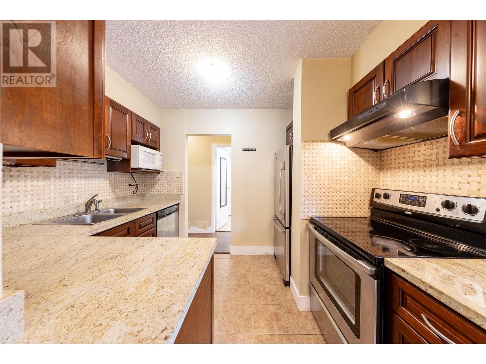 Photo 13 of 204 9521 Cardston Court, Burnaby BC