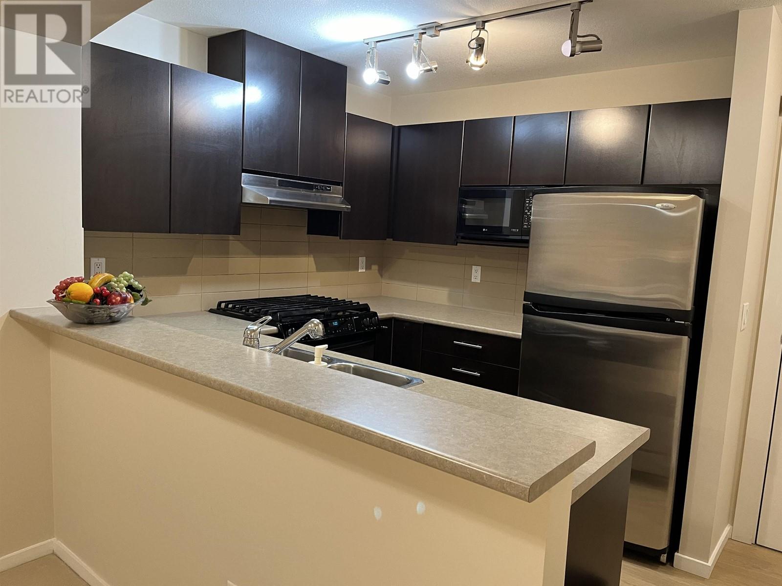 Photo 1 of 409 9319 University Crescent, Burnaby BC
