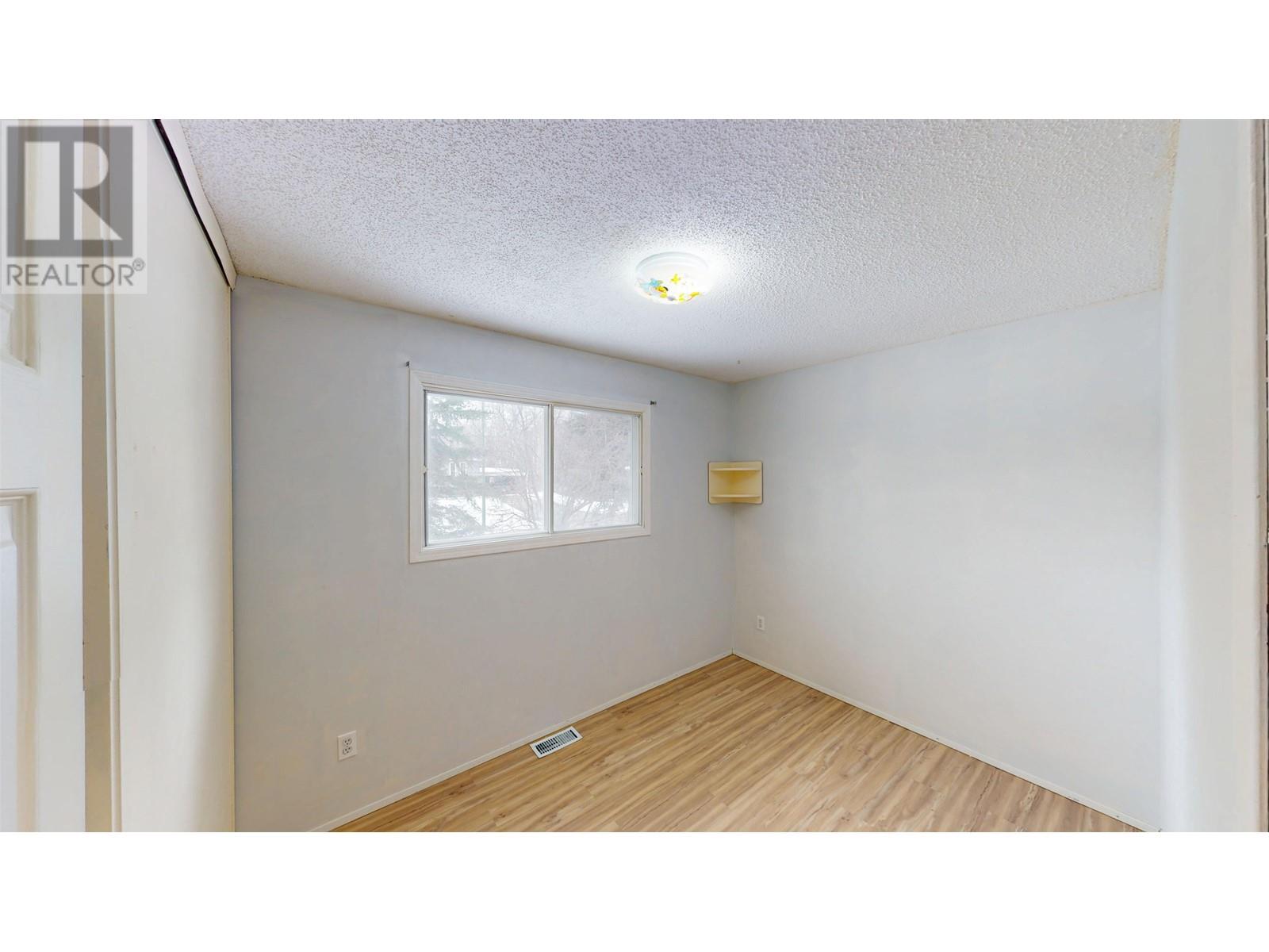 Photo 10 of 10109 Macintosh Crescent, Hudsons Hope BC