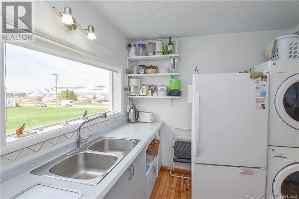 Photo 21 of 90 Saint Pierre Est Boulevard, Caraquet NB