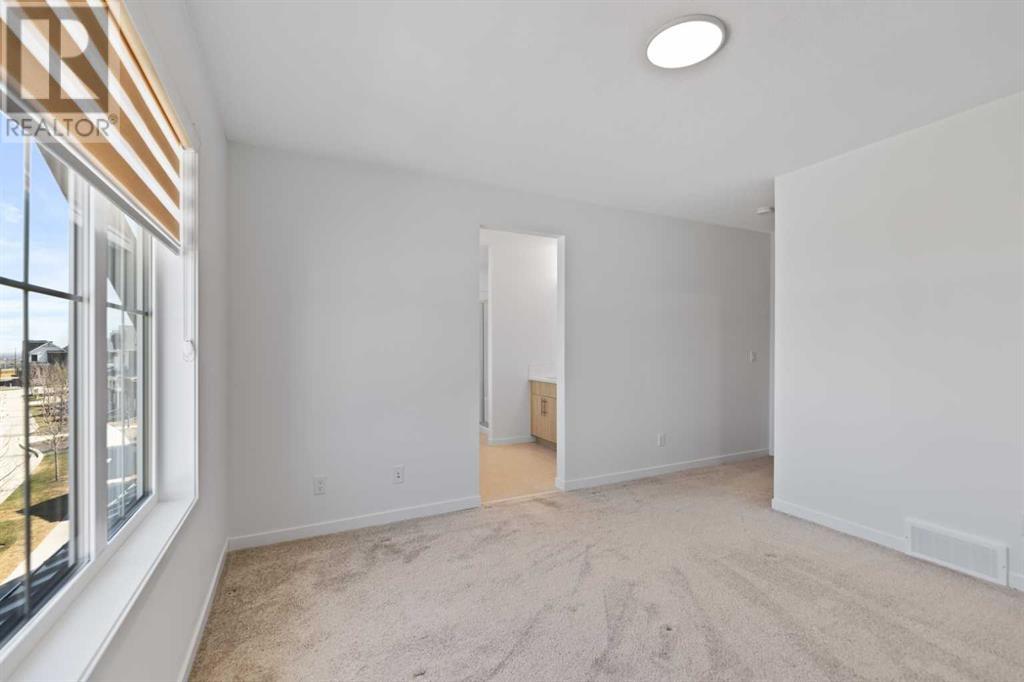 Single Family House for Sale in  Alpine Drive SW Alpine Park Calgary 