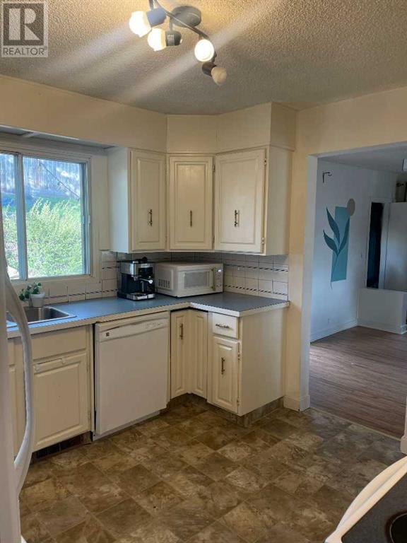Single Family House Bungalow for Sale in   Avenue NW Montgomery Calgary 