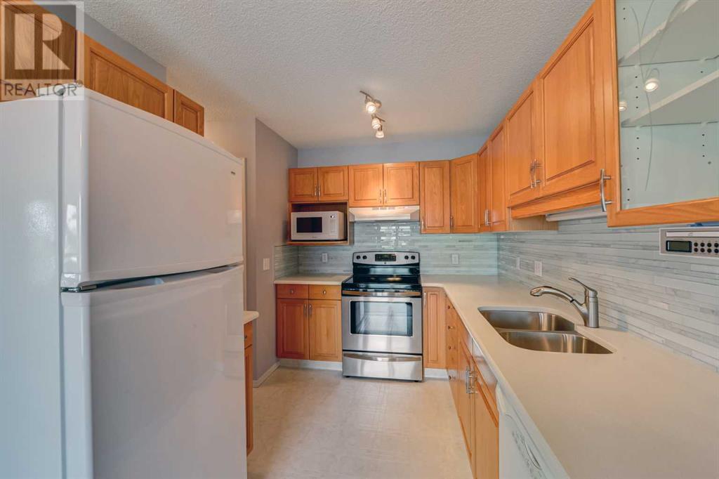 Single Family House Bungalow for Sale in  Macewan Ridge Villas NW MacEwan Glen Calgary 