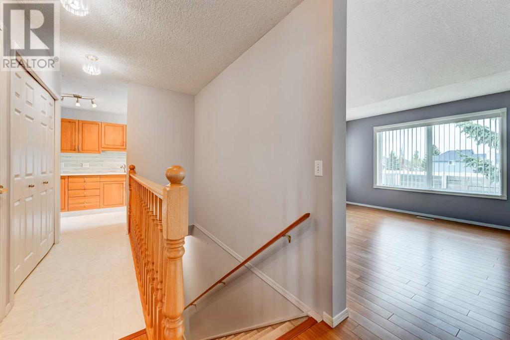Single Family House Bungalow for Sale in  Macewan Ridge Villas NW MacEwan Glen Calgary 