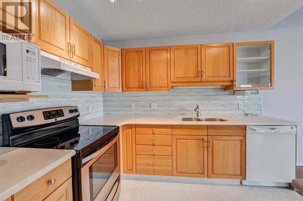 Single Family House Bungalow for Sale in  Macewan Ridge Villas NW MacEwan Glen Calgary 