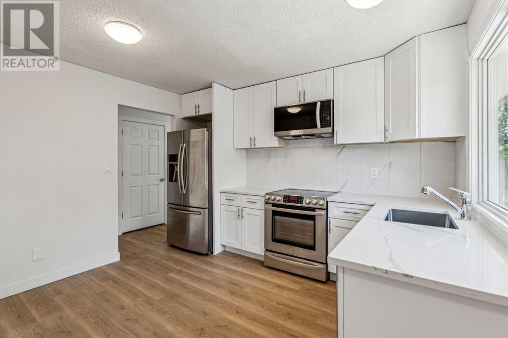 Single Family House Bungalow for Sale in  midridge Close SE Midnapore Calgary 