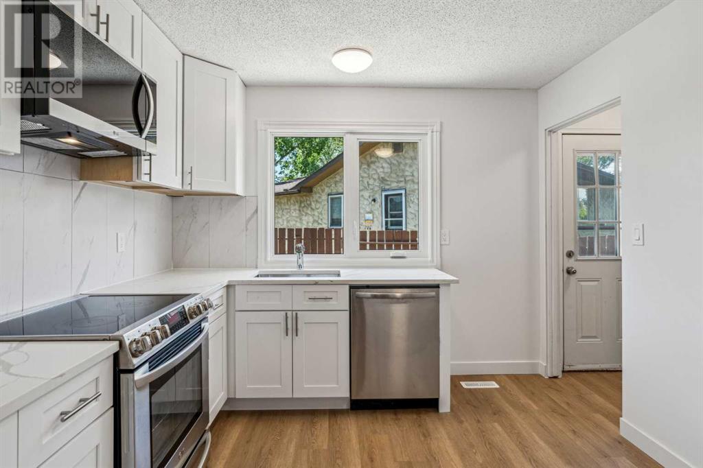 Single Family House Bungalow for Sale in  midridge Close SE Midnapore Calgary 
