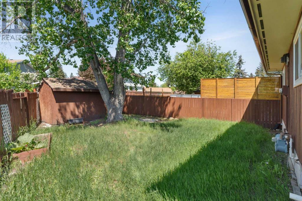 Single Family House Bungalow for Sale in  midridge Close SE Midnapore Calgary 