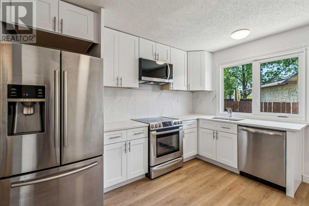 Single Family House Bungalow for Sale in  midridge Close SE Midnapore Calgary 