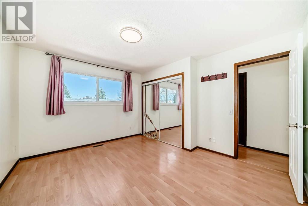 Single Family House Bi-level for Sale in  Sandarac Road NW Sandstone Valley Calgary 