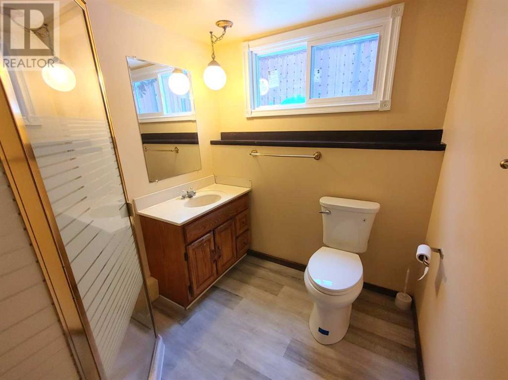 Single Family House Bi-level for Sale in  Sandarac Road NW Sandstone Valley Calgary 