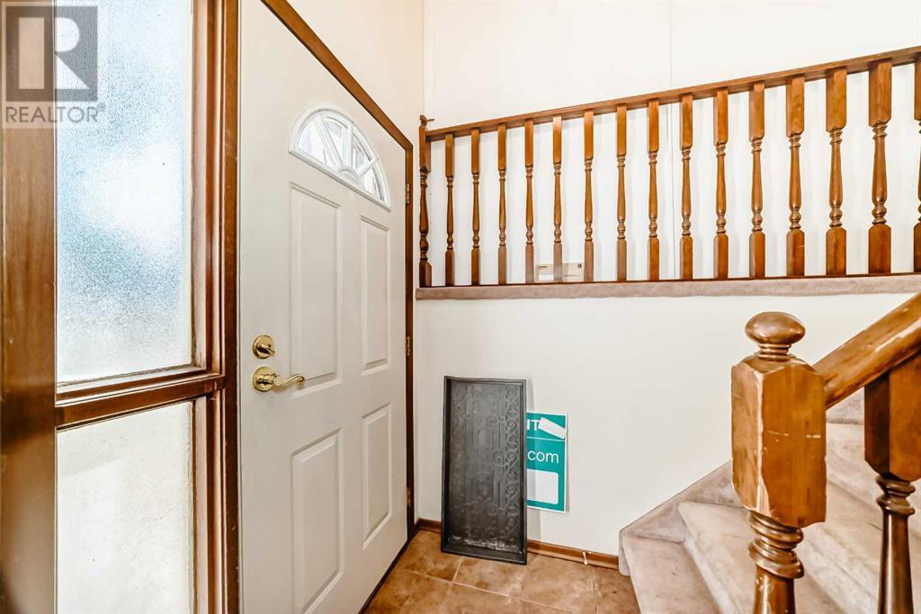 Single Family House Bi-level for Sale in  Sandarac Road NW Sandstone Valley Calgary 