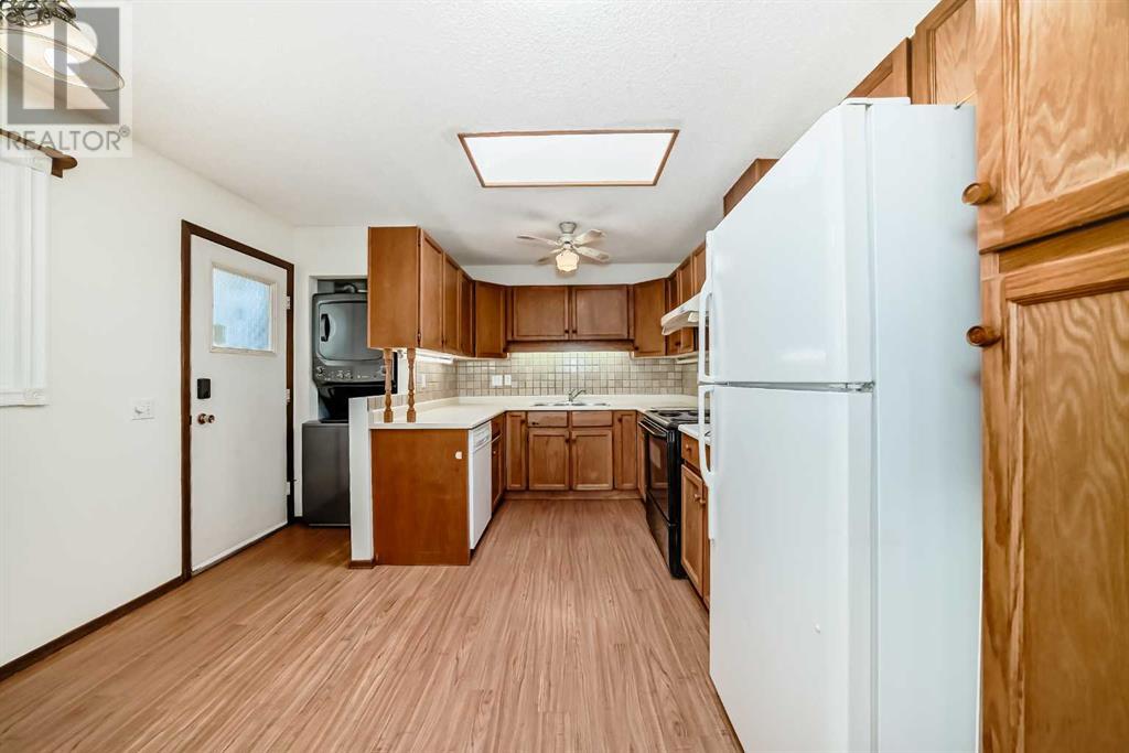 Single Family House Bi-level for Sale in  Sandarac Road NW Sandstone Valley Calgary 