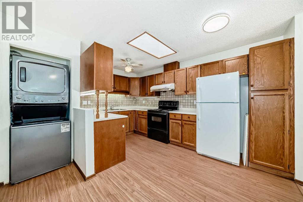 Single Family House Bi-level for Sale in  Sandarac Road NW Sandstone Valley Calgary 