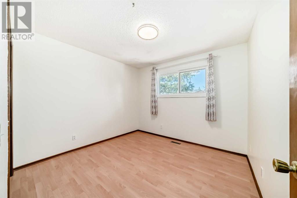 Single Family House Bi-level for Sale in  Sandarac Road NW Sandstone Valley Calgary 