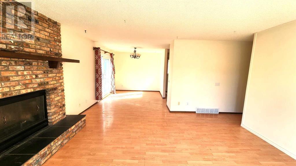 Single Family House Bi-level for Sale in  Sandarac Road NW Sandstone Valley Calgary 