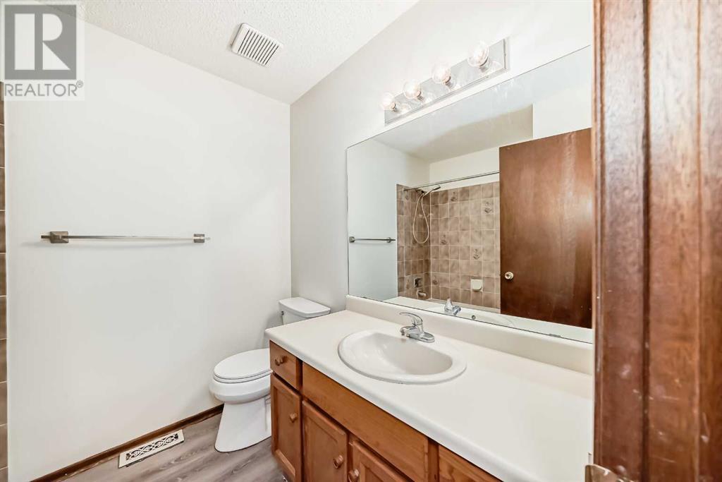 Single Family House Bi-level for Sale in  Sandarac Road NW Sandstone Valley Calgary 
