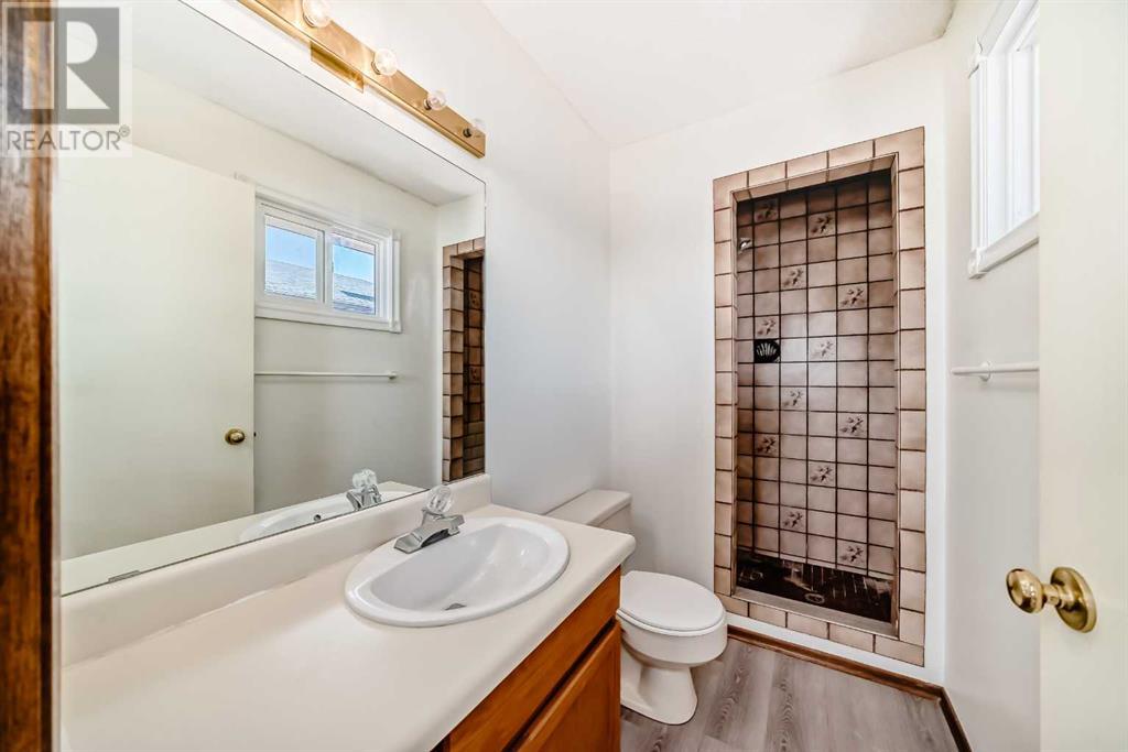 Single Family House Bi-level for Sale in  Sandarac Road NW Sandstone Valley Calgary 