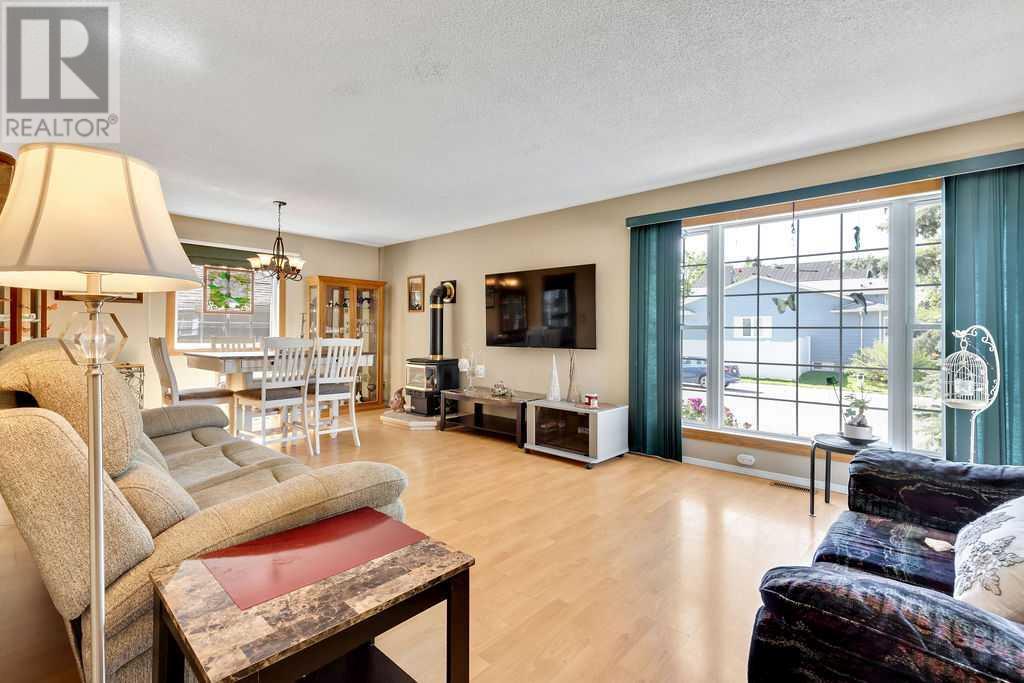 Single Family House Bungalow for Sale in  Sundown Green SE Sundance Calgary 